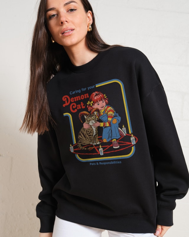 Caring for Your Demon Cat Sweatshirt by Steven Rhodes Unisex Graphic